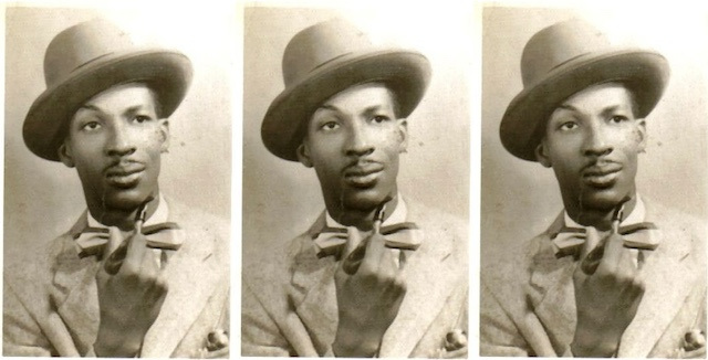 Tripled photograph of Jacques Stephen Alexis, with a mustache and a raised eyebrow, wearing a hat and bow tie and holding a pipe.