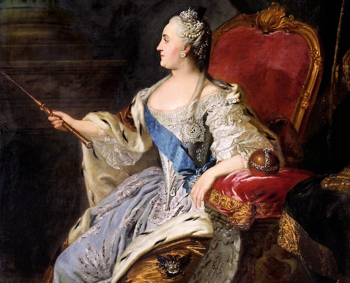 A painting of a woman in a frilly blue and white dress sitting in a velvet throne and holding a gold scepter. 