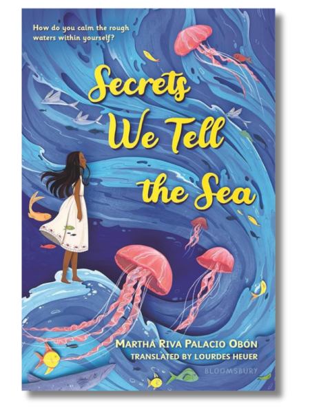 Book cover of "Secrets We Tell the Sea." A girl in a white dress stands on a wave, surrounded by large pink jellyfish and multicolored fish.