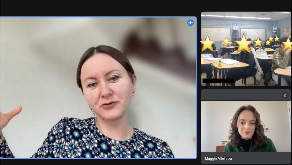 A virtual meeting screen where Iryna Shuvalova (left) speaks to a classroom of students (right). 